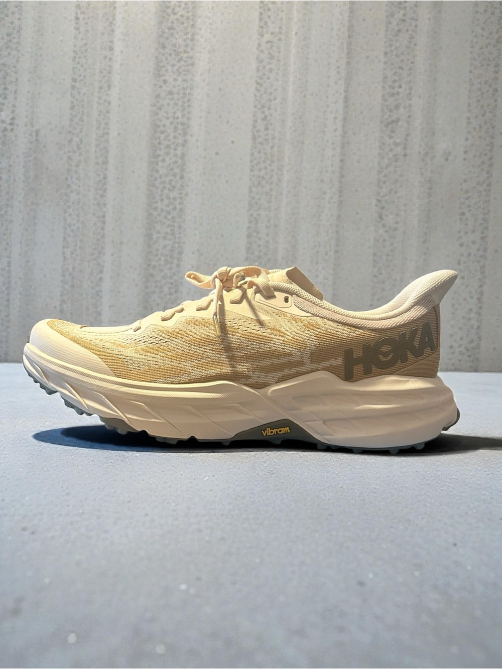 Hoka Speedgoat 5 in the "Vanilla / Wheat" colorway